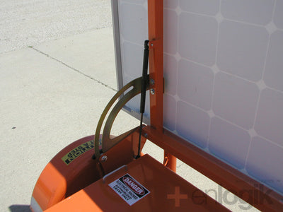 This is the backside of the solar panel. You can see the bracket used to set the solar panel to the optimum angle for your region to maximize exposure to the sun. Also shown is a gas shock. We use a pair of gas shocks on the solar panel as well as a pair of gas shocks on the battery lid. These gas shocks assist in the lifting and provide stability.