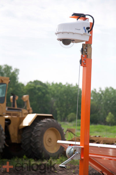 The Worksite Hawk video camera shown in the protective, heat-controlled case before the mast is extended. The cellular modem and technology is protected from the elements. The antenna is mounted for securing the maximum signal available.
